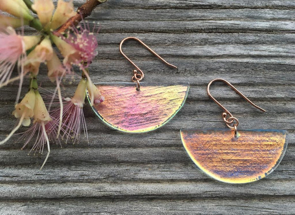 Half-moon dichroic glass and rose gold filled wire earrings.